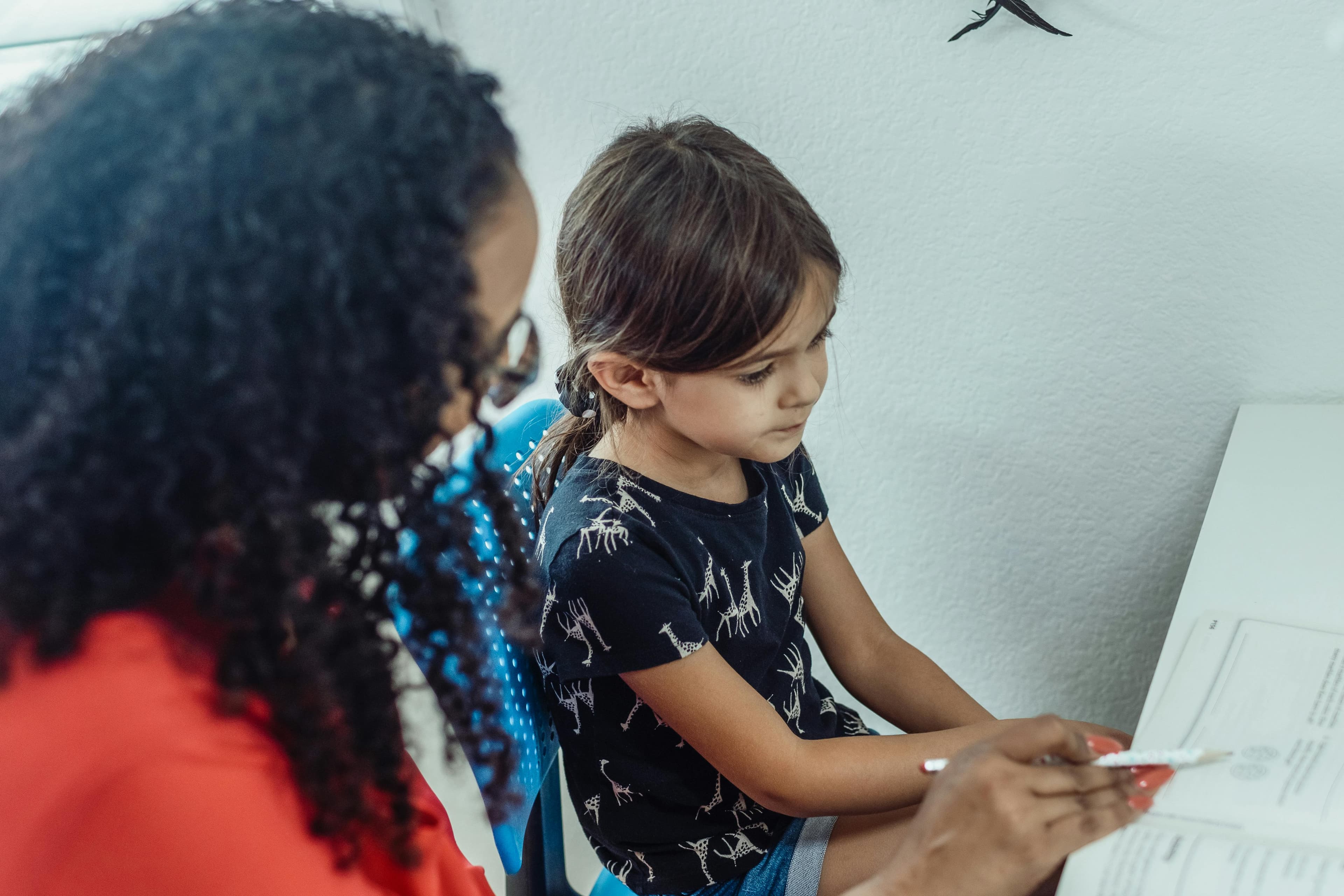 Student working with an online math tutor